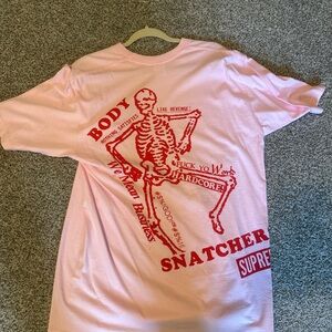 Supreme Pink Tee with Red Skeleton Graphic